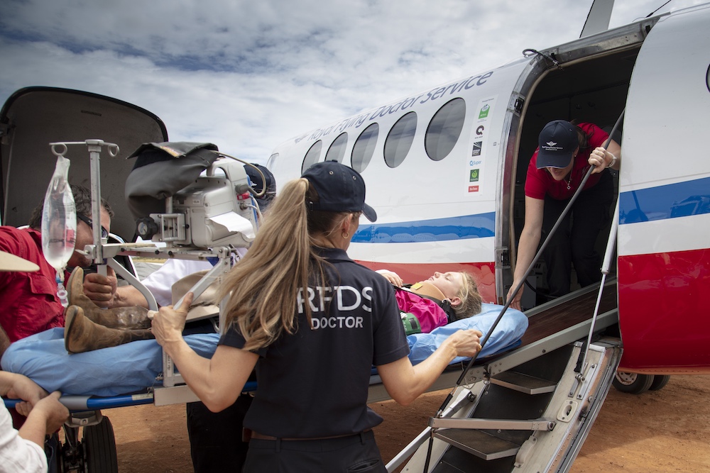 A healthcare patient is loaded on board with the RFDS 