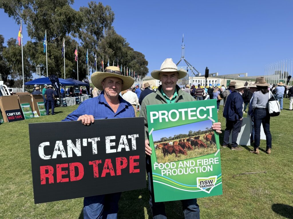 Signs at the National Farmer Rally in Canberra